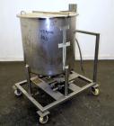 Used Walker Stainless Tank, 80 Gallon, 316 Stainless Steel, Vertical. 30” Diameter x 29” straight side. Open top with a 2 piece cover, coned bottom. Provision for a clamp-on agitator. 1-1/2” Tri-clam...