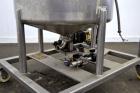 Used Walker Stainless Tank, 80 Gallon, 316 Stainless Steel, Vertical. 30” Diameter x 29” straight side. Open top with a 2 piece cover, coned bottom. Provision for a clamp-on agitator. 1-1/2” Tri-clam...