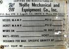 USED: Wolfe mechanical tank, 275 gallon, 304 stainless steel, vertical. Approximate 36