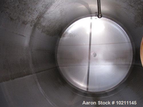 Used-Tank, 1800 Gallons, Stainless Steel, Horizontal.  Sanitary fittings, internal CIP spray ball.  Side manway with cover. ...