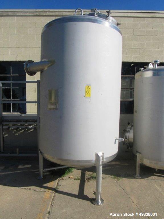 Used Lee Industries Model 1100DBT  304L Stainless Steel.Single Wall Tank,1100 gallon capacity. Approx. 5 dia. X 7 straight side. Dished top and Bottom 24" top manhole  (1) 6" dia. (1) 4" dia. Top inl...
