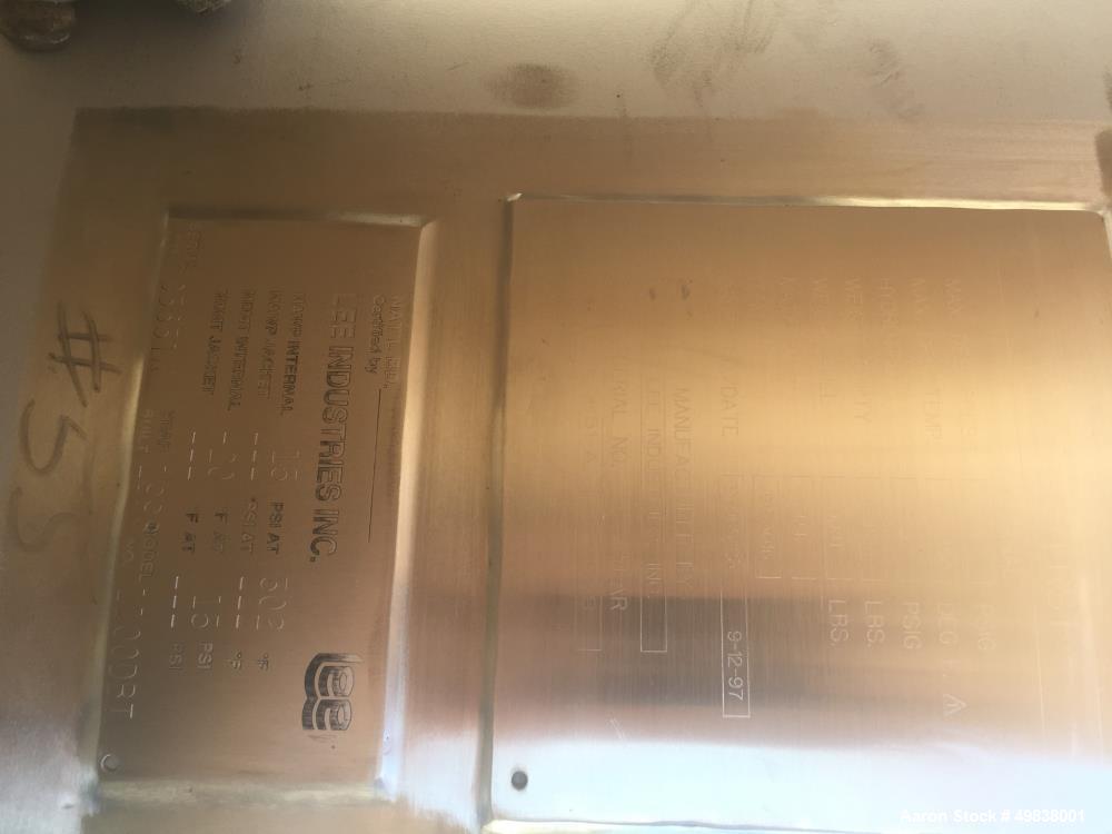 Used Lee Industries Model 1100DBT  304L Stainless Steel.Single Wall Tank,1100 gallon capacity. Approx. 5 dia. X 7 straight side. Dished top and Bottom 24" top manhole  (1) 6" dia. (1) 4" dia. Top inl...