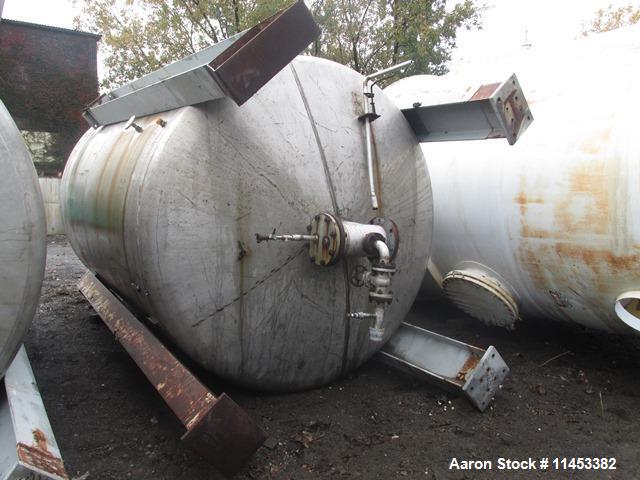 Used- 4500 Gallon Agitated Tank. 316 stainless steel construction. Approximately 8' diameter x 11' straight side, dish top a...