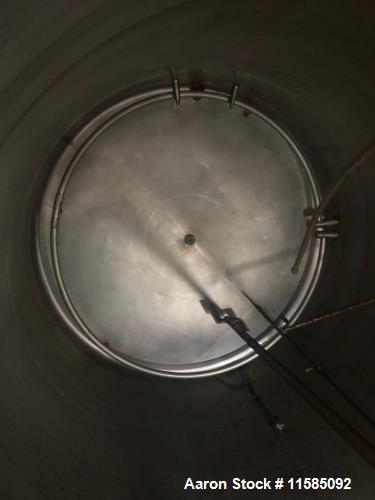 Used-Approximately 1500 Gallon Vertical Stainless Steel Food Grade Mix Tank