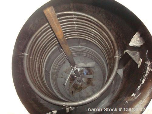 Unused-Used: 2500 gallon stainless steel mixing tank. Dish 144" side wall x 72" diameter, 19' overall height. 3 hp motor @ 1...