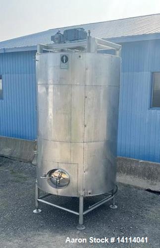 Used 2,500 Gallon Stainless Steel Jacketed Tank, Insulated with Agitator. Interior Dimensions: 75" diameter x 120" straight side, plus cone bottom. Center discharge: 3" reduced to 2.5" tri-clamp with...