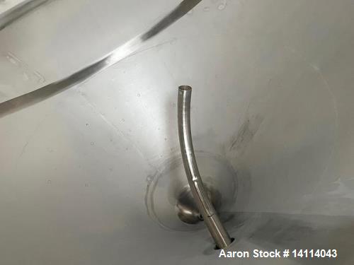 Unused- 2000 Gallon 304 Stainless Steel Jacketed Brewery Tank. Insulated. 51 BBL Brewery Tank. Jacketed for cooling, rated 36.25psi. Cone bottom discharge: 2" tri-clamp with pipe to side and butterfl...
