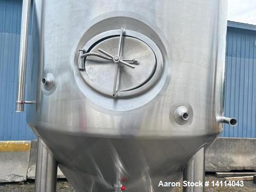 Unused- 2000 Gallon 304 Stainless Steel Jacketed Brewery Tank. Insulated. 51 BBL Brewery Tank. Jacketed for cooling, rated 36.25psi. Cone bottom discharge: 2" tri-clamp with pipe to side and butterfl...