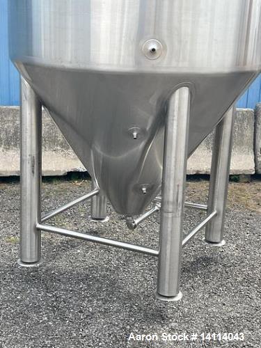 Unused- 2000 Gallon 304 Stainless Steel Jacketed Brewery Tank. Insulated. 51 BBL Brewery Tank. Jacketed for cooling, rated 36.25psi. Cone bottom discharge: 2" tri-clamp with pipe to side and butterfl...