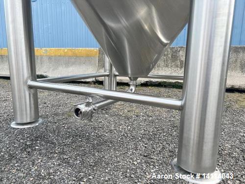 Unused- 2000 Gallon 304 Stainless Steel Jacketed Brewery Tank. Insulated. 51 BBL Brewery Tank. Jacketed for cooling, rated 36.25psi. Cone bottom discharge: 2" tri-clamp with pipe to side and butterfl...