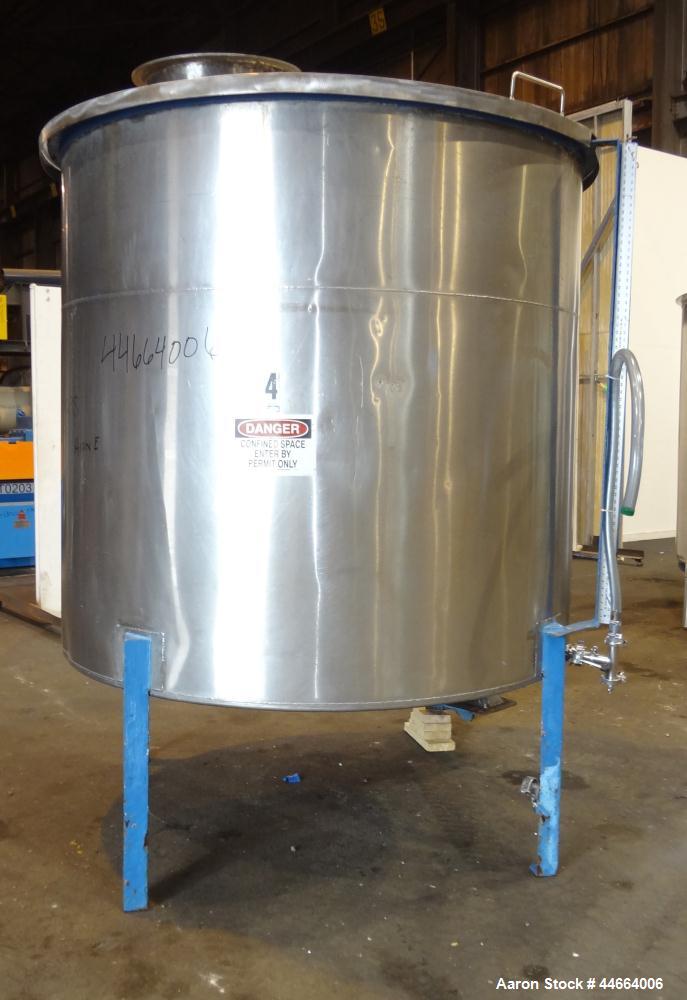 Used Charles S. Jacobwitz Tank, 1500 Gallons, 304 Stainless Steel, Vertical. Approximately 78"diameter x 70" straight side, open top with (1) cover, cone bottom. Side bottom entering agitator with (3...