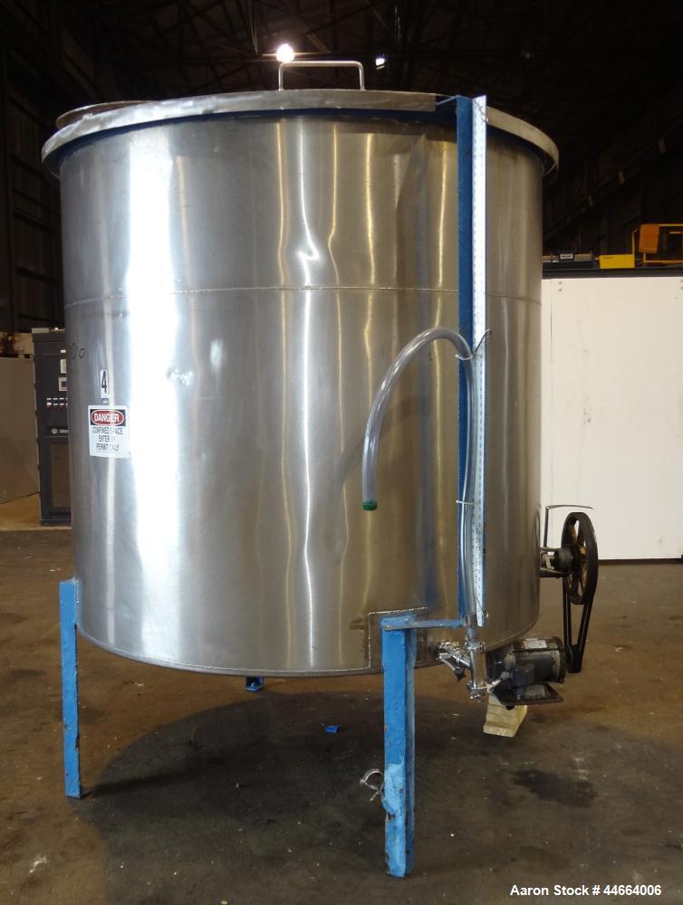 Used Charles S. Jacobwitz Tank, 1500 Gallons, 304 Stainless Steel, Vertical. Approximately 78"diameter x 70" straight side, open top with (1) cover, cone bottom. Side bottom entering agitator with (3...