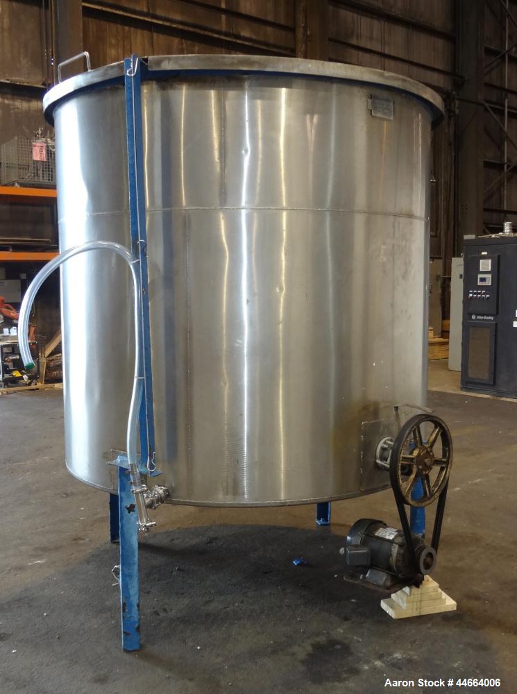 Used Charles S. Jacobwitz Tank, 1500 Gallons, 304 Stainless Steel, Vertical. Approximately 78"diameter x 70" straight side, open top with (1) cover, cone bottom. Side bottom entering agitator with (3...