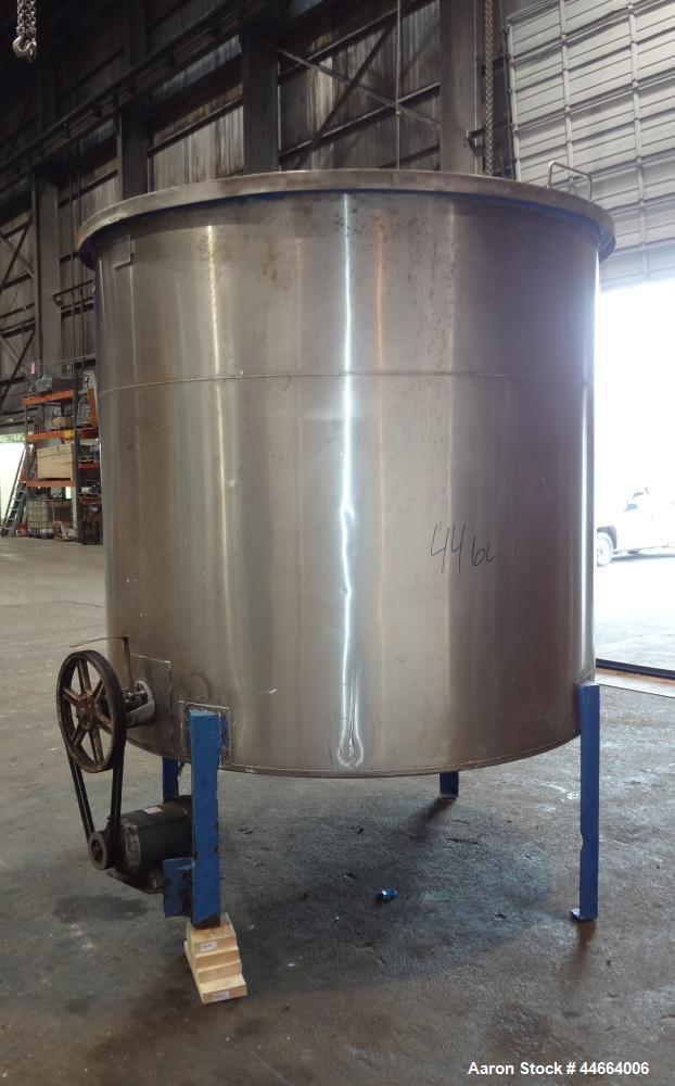 Used Charles S. Jacobwitz Tank, 1500 Gallons, 304 Stainless Steel, Vertical. Approximately 78"diameter x 70" straight side, open top with (1) cover, cone bottom. Side bottom entering agitator with (3...