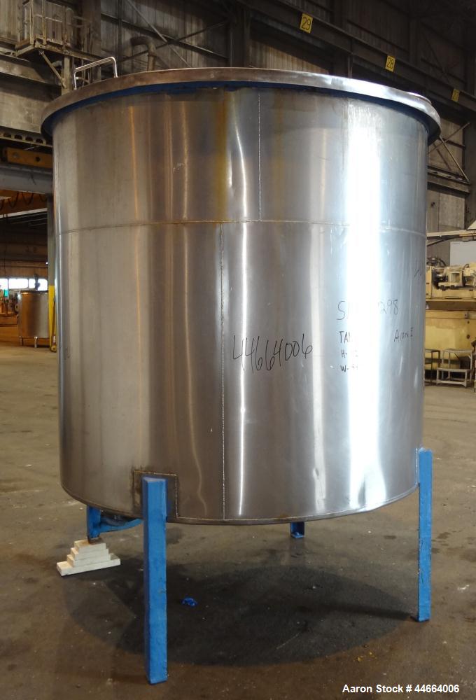 Used Charles S. Jacobwitz Tank, 1500 Gallons, 304 Stainless Steel, Vertical. Approximately 78"diameter x 70" straight side, open top with (1) cover, cone bottom. Side bottom entering agitator with (3...
