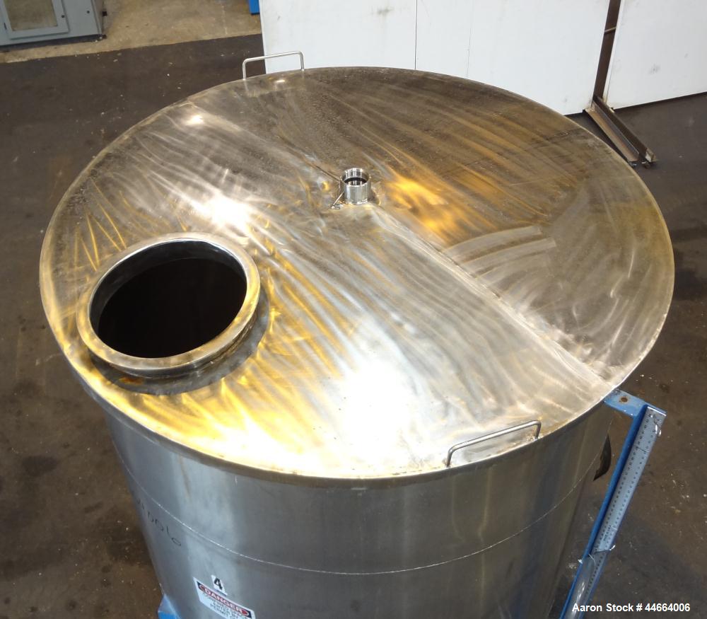 Used Charles S. Jacobwitz Tank, 1500 Gallons, 304 Stainless Steel, Vertical. Approximately 78"diameter x 70" straight side, open top with (1) cover, cone bottom. Side bottom entering agitator with (3...