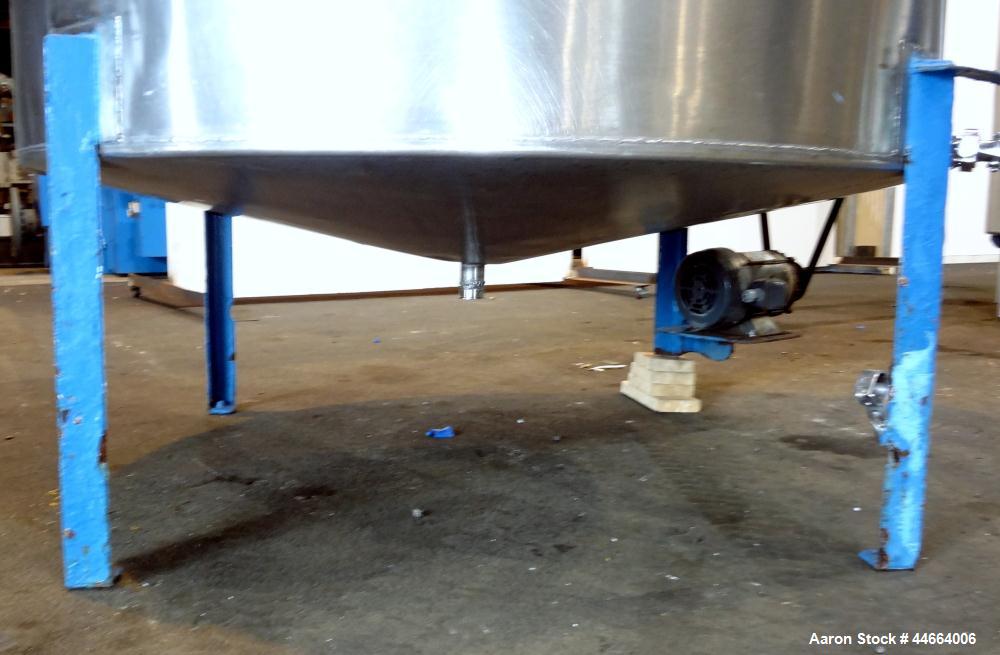 Used Charles S. Jacobwitz Tank, 1500 Gallons, 304 Stainless Steel, Vertical. Approximately 78"diameter x 70" straight side, open top with (1) cover, cone bottom. Side bottom entering agitator with (3...