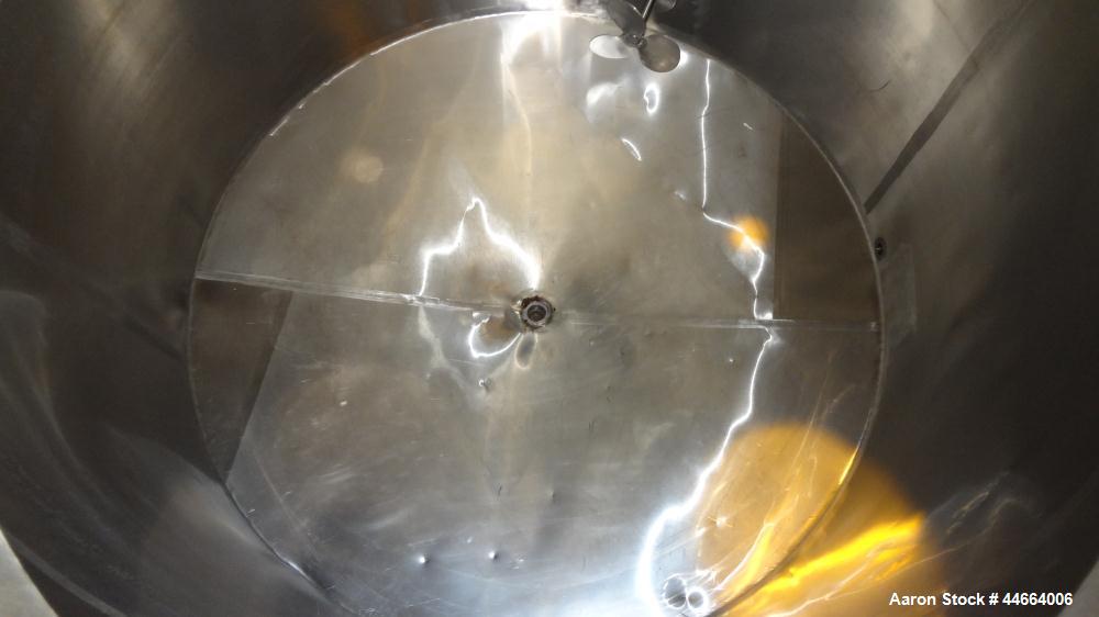 Used Charles S. Jacobwitz Tank, 1500 Gallons, 304 Stainless Steel, Vertical. Approximately 78"diameter x 70" straight side, open top with (1) cover, cone bottom. Side bottom entering agitator with (3...