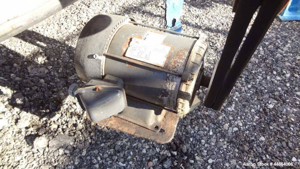 Used Charles S. Jacobwitz Tank, 1500 Gallons, 304 Stainless Steel, Vertical. Approximately 78"diameter x 70" straight side, open top with (1) cover, cone bottom. Side bottom entering agitator with (3...