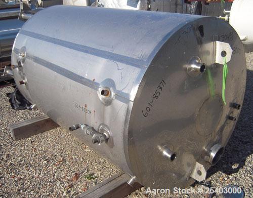 Used Alloy & Steel Fab tank, 1100 gallon, stainless steel, vertical. 68" diameter x 72" straight side. Flat top with 20" manway, sloped bottom. Bottom jacketed, rated 50 psi at 300 deg F. Agitator br...
