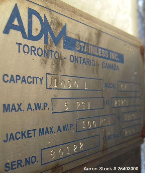 Used Alloy & Steel Fab tank, 1100 gallon, stainless steel, vertical. 68" diameter x 72" straight side. Flat top with 20" manway, sloped bottom. Bottom jacketed, rated 50 psi at 300 deg F. Agitator br...