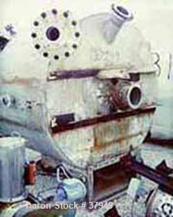 USED: McIver Smith 1000 gal vertical tank. Flat top, dished bottom. The tank includes the following nozzles: top (1) 10" flanged, (1) 6" flanged, (1) 8" flanged center for agitator, 16 x 30" charging...