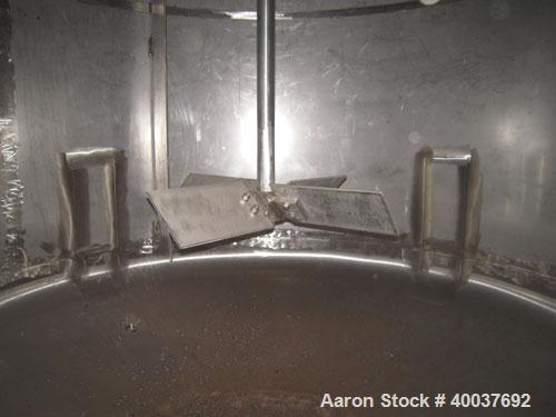 Used Douglas Brothers Pressure Tank, 3000 gallon, Stainless steel, Vertical. Approximately 96" diameter x 84" straight side, dished top and bottom. Internal rated 15 psi at 325 deg.f.. Top entering P...
