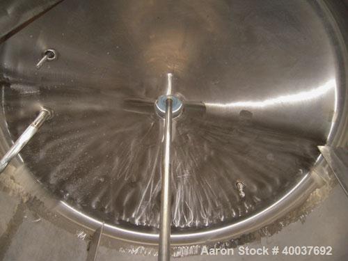 Used Douglas Brothers Pressure Tank, 3000 gallon, Stainless steel, Vertical. Approximately 96" diameter x 84" straight side, dished top and bottom. Internal rated 15 psi at 325 deg.f.. Top entering P...