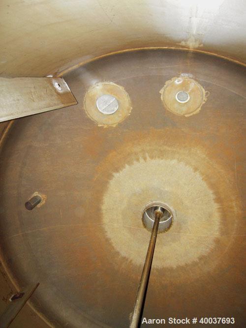Used P.X. Engineering Tank, 2000 gallon, Stainless steel, Vertical. Approximately 84" diameter x 72" straight side, dished top and bottom. Top entering Cleveland agitator, model FGBS4, approximate 2"...