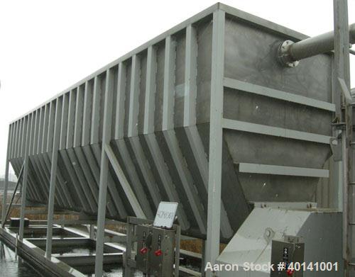 Used: Moon Fabricators 316 stainless steel tank, rectangular, with bottom screw conveyor discharge. Year 2000, serial #B-8025. With 1,000 gallon stainless steel tank.