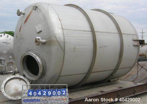 Used Northland Stainless pressure tank, 4800 gallon, 316 stainless steel, vertical. 101 1/2" diameter x  10'7" straight side, dished top and bottom. Internal rated FV and 35 psi at 200 deg F. Opening...