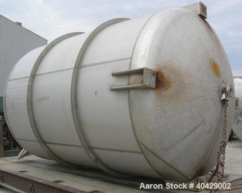 Used Northland Stainless pressure tank, 4800 gallon, 316 stainless steel, vertical. 101 1/2" diameter x  10'7" straight side, dished top and bottom. Internal rated FV and 35 psi at 200 deg F. Opening...