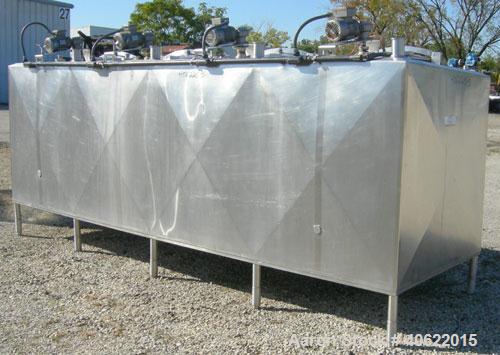 Used Cherry Burrell 4 compartment tank, approximately 350 gallons each, 304 stainless steel.  Each compartment measures 39" long x 45" wide x approximately 46" deep.  Flat top, sloped bottom.  Each c...