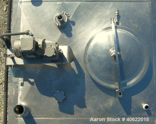 Used Cherry Burrell 4 compartment tank, approximately 350 gallons each, 304 stainless steel.  Each compartment measures 39" long x 45" wide x approximately 46" deep.  Flat top, sloped bottom.  Each c...