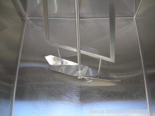 Used Cherry Burrell 4 compartment tank, approximately 350 gallons each, 304 stainless steel.  Each compartment measures 39" long x 45" wide x approximately 46" deep.  Flat top, sloped bottom.  Each c...