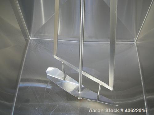 Used Cherry Burrell 4 compartment tank, approximately 350 gallons each, 304 stainless steel.  Each compartment measures 39" long x 45" wide x approximately 46" deep.  Flat top, sloped bottom.  Each c...