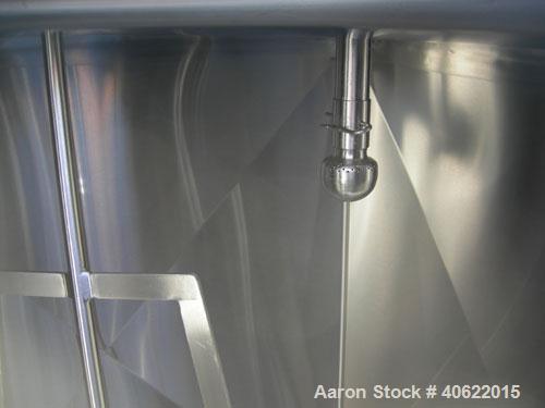 Used Cherry Burrell 4 compartment tank, approximately 350 gallons each, 304 stainless steel.  Each compartment measures 39" long x 45" wide x approximately 46" deep.  Flat top, sloped bottom.  Each c...