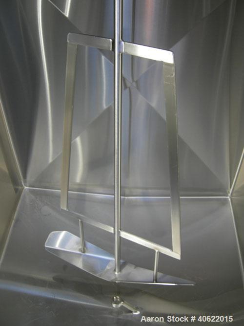 Used Cherry Burrell 4 compartment tank, approximately 350 gallons each, 304 stainless steel.  Each compartment measures 39" long x 45" wide x approximately 46" deep.  Flat top, sloped bottom.  Each c...