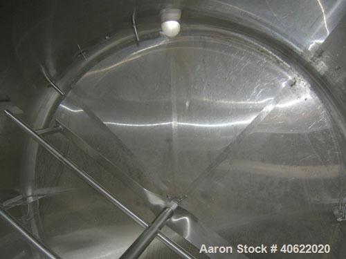 Used DCI tank, 3500 Gallon, 304 stainless steel, jacketed.  107" diameter x 91 3/16" straight side.  Dish top, sloped bottom.  12 3/4" bottom sidewall dimple jacket rated 150 psi @ 100 degrees F.  Ga...