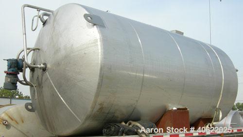 Used DCI tank, 4500 gallon, 304 stainless steel, jacketed. 89 1/4" diameter x 168" straight side. Dish top, sloped bottom. 22" bottom sidewall dimple jacket rated 150 psi @ 100 degrees F. Top opening...