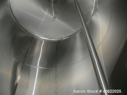 Used DCI tank, 4500 gallon, 304 stainless steel, jacketed. 89 1/4" diameter x 168" straight side. Dish top, sloped bottom. 22" bottom sidewall dimple jacket rated 150 psi @ 100 degrees F. Top opening...