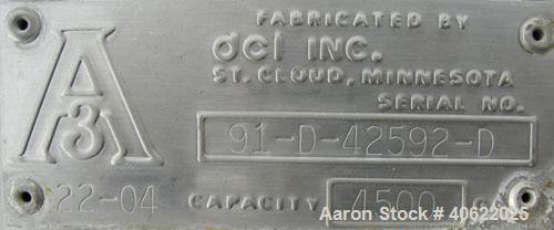 Used DCI tank, 4500 gallon, 304 stainless steel, jacketed. 89 1/4" diameter x 168" straight side. Dish top, sloped bottom. 22" bottom sidewall dimple jacket rated 150 psi @ 100 degrees F. Top opening...