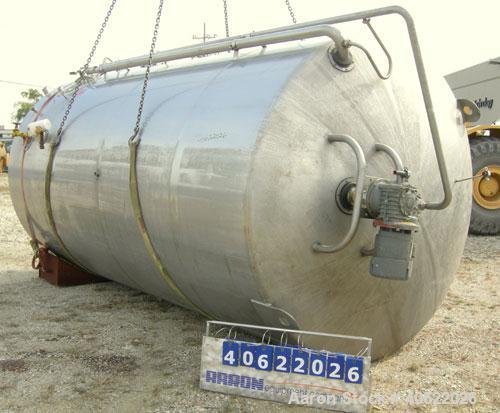Used DCI tank, 4500 gallon, 304 stainless steel, jacketed. 89 1/4" diameter x 168" straight side. Dish top, sloped bottom. 22" bottom sidewall dimple jacket rated 150 psi @ 100 degrees F. Top opening...