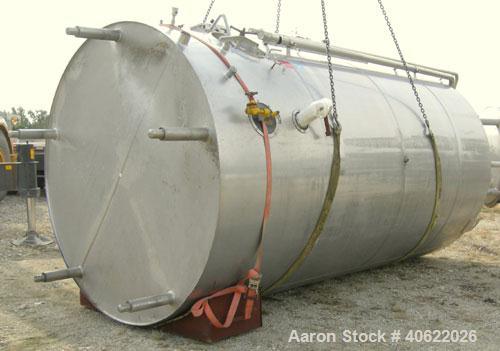 Used DCI tank, 4500 gallon, 304 stainless steel, jacketed. 89 1/4" diameter x 168" straight side. Dish top, sloped bottom. 22" bottom sidewall dimple jacket rated 150 psi @ 100 degrees F. Top opening...