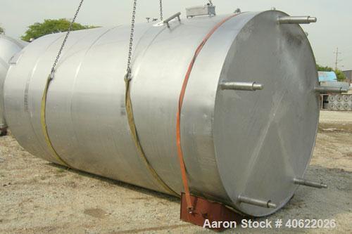Used DCI tank, 4500 gallon, 304 stainless steel, jacketed. 89 1/4" diameter x 168" straight side. Dish top, sloped bottom. 22" bottom sidewall dimple jacket rated 150 psi @ 100 degrees F. Top opening...