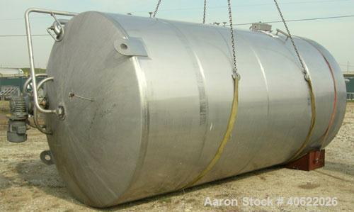 Used DCI tank, 4500 gallon, 304 stainless steel, jacketed. 89 1/4" diameter x 168" straight side. Dish top, sloped bottom. 22" bottom sidewall dimple jacket rated 150 psi @ 100 degrees F. Top opening...
