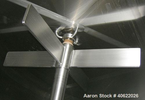 Used DCI tank, 4500 gallon, 304 stainless steel, jacketed. 89 1/4" diameter x 168" straight side. Dish top, sloped bottom. 22" bottom sidewall dimple jacket rated 150 psi @ 100 degrees F. Top opening...