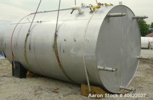 Used DCI tank, 4500 gallon, 304 stainless steel, jacketed. 89 1/4" diameter x 168" straight side. Dish top, sloped bottom. 22" bottom sidewall dimple jacket rated 150 psi @ 100 degrees F. Top opening...