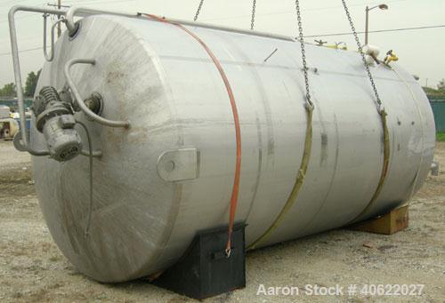 Used DCI tank, 4500 gallon, 304 stainless steel, jacketed. 89 1/4" diameter x 168" straight side. Dish top, sloped bottom. 22" bottom sidewall dimple jacket rated 150 psi @ 100 degrees F. Top opening...