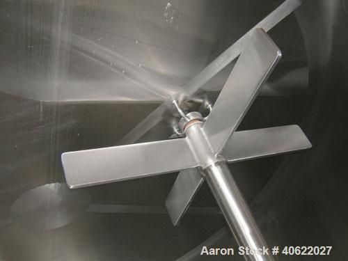 Used DCI tank, 4500 gallon, 304 stainless steel, jacketed. 89 1/4" diameter x 168" straight side. Dish top, sloped bottom. 22" bottom sidewall dimple jacket rated 150 psi @ 100 degrees F. Top opening...
